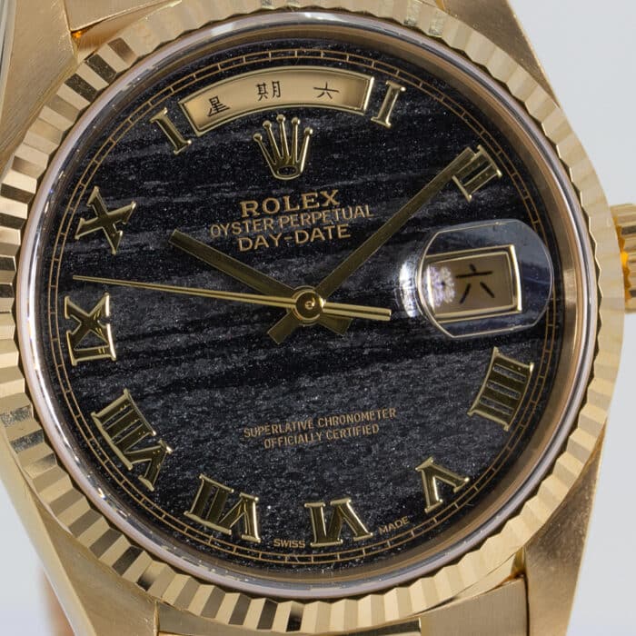 Rolex Oyster Perpetual DayDate 18kt Yellow Gold Ferrite Stone Dial
